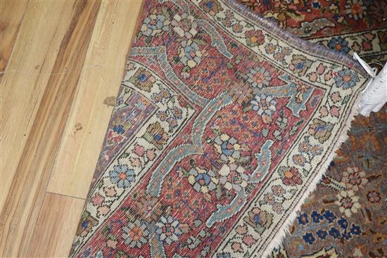 A Persian indigo ground carpet 330 x 230cm approx.